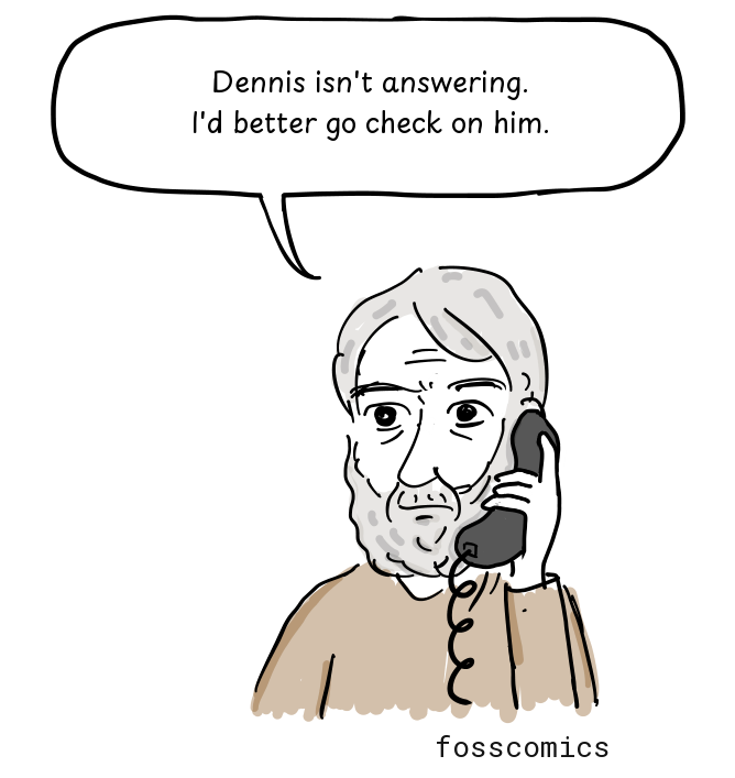A worried colleague holds the phone.