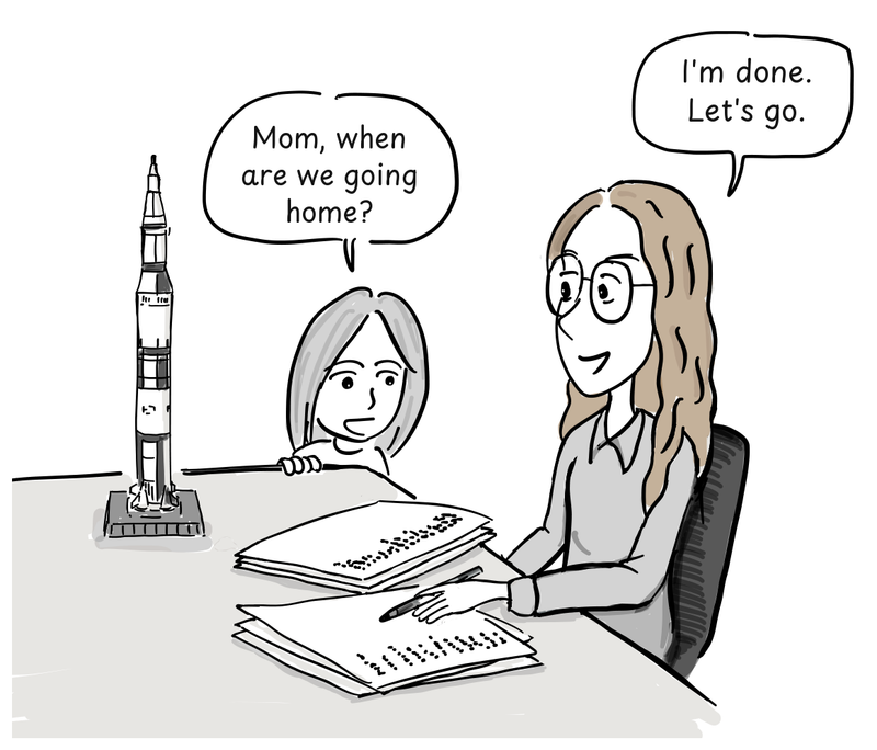 Margaret Hamilton works at a desk while her daughter waits beside a model of the Saturn V rocket.