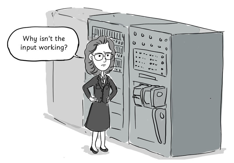 Grace Hopper stands with her hands on her hips beside the malfunctioning Harvard Mark II.