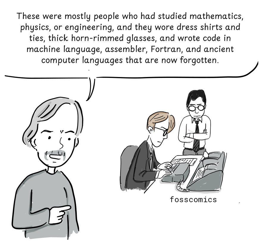 Raymond points toward two formally dressed programmers working at a large console.